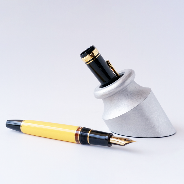 Penwell Classic matte aluminum pen holder in silver with a sleek, modern design for desk organization.