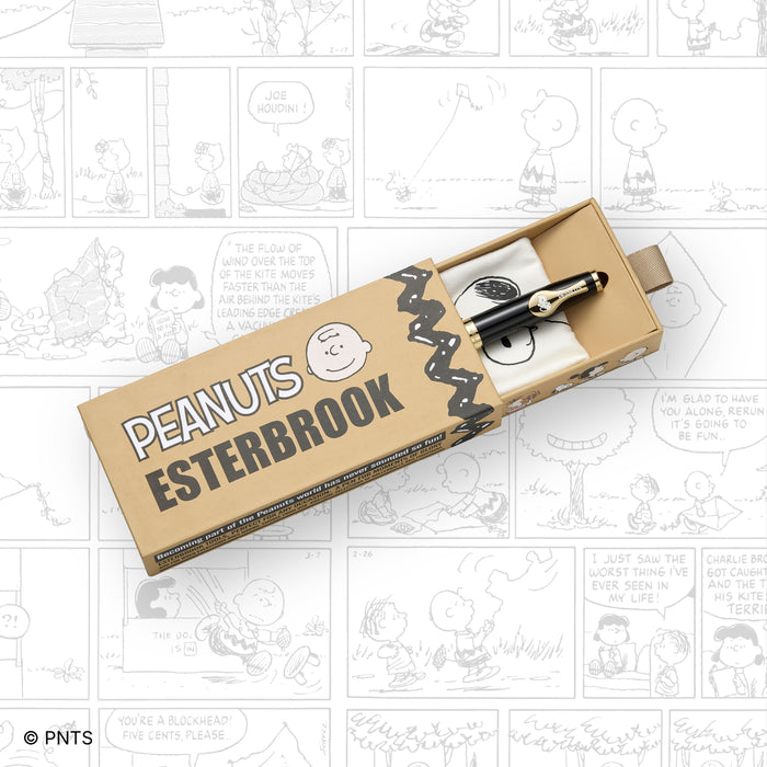 Esterbrook Snoopy Estie fountain pen with comic book background featuring Snoopy from the Peanuts comic series.