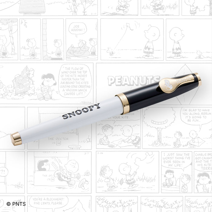 Esterbrook x PEANUTS Snoopy Estie fountain pen with comic background, featuring a playful Snoopy design and classic fountain pen details.