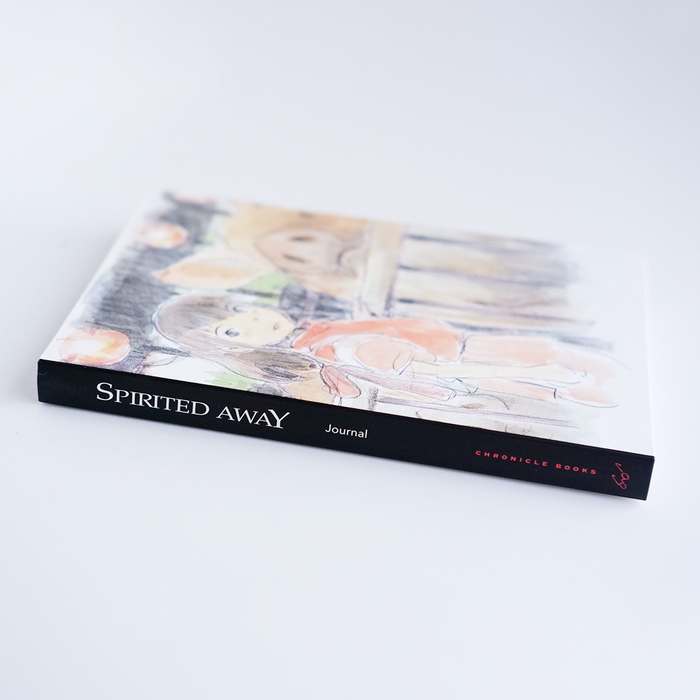 Spirited Away journal by Chronicle Books featuring a colorful cover with character artwork, ideal for note-taking and creative writing.