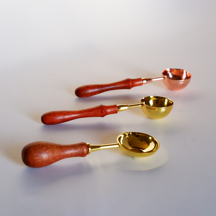 Papier Plume wax melting spoon with a sleek, stainless steel design for safe and easy wax melting and application.