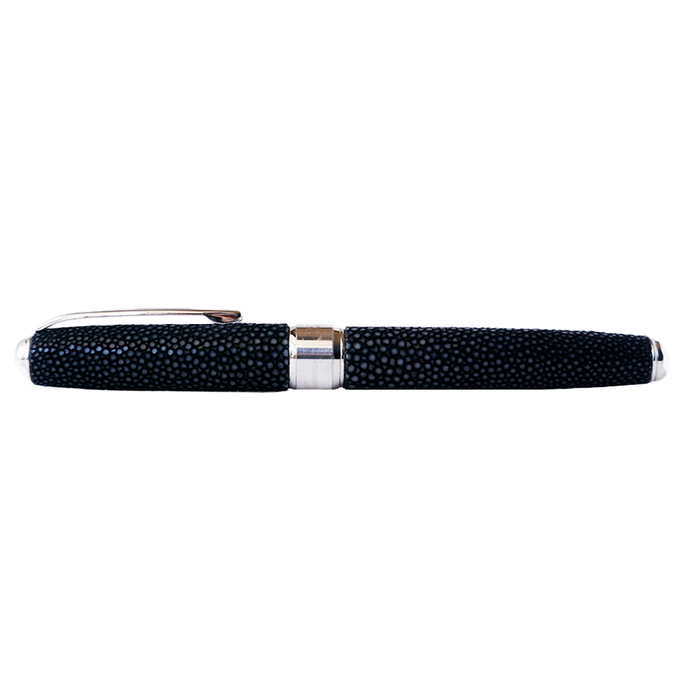 Grifos fountain pen with volcanic grey resin body and gold accents, showcasing sleek design and fine nib for writing excellence.