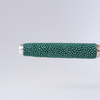 Green Grifos fountain pen with a stingray leather grip in Raya Green, showcasing elegant design and smooth writing performance.