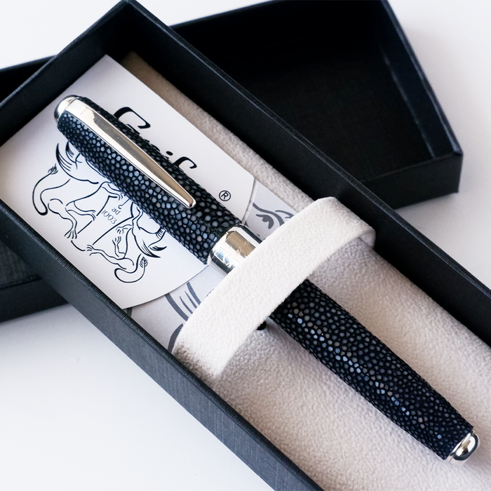 Grifos fountain pen with volcanic grey finish and plume design, featuring a sleek, elegant look suitable for writing enthusiasts.