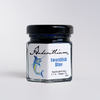 Anderillium Swordfish Blue fountain pen ink in a glass bottle with a label, vibrant blue color, suitable for writing and calligraphy