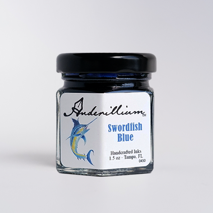 Anderillium Swordfish Blue fountain pen ink in a glass bottle with a label, vibrant blue color, suitable for writing and calligraphy