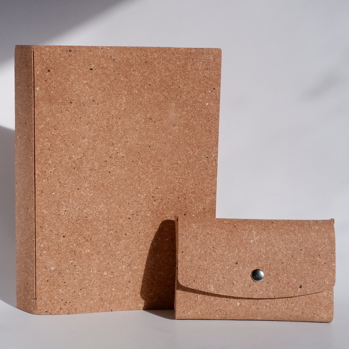 Papier Plume Swatch Book set with tan-colored pages, showcasing a variety of color samples and swatch samples.