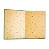 A Chronicle Books Studio Ghibli My Neighbor Totoro journal with a colorful cover featuring Totoro and forest imagery.