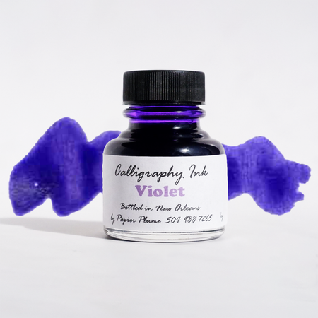 Violet Papier Plume bottled calligraphy ink in a glass bottle, designed for elegant writing and artistic calligraphy projects.