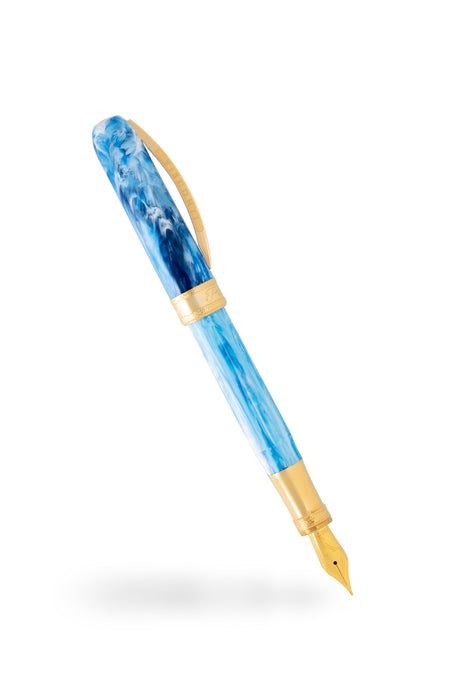 Visconti Comedia Paradiso fountain pen with green and gold accents, elegant design, and smooth ink nib.