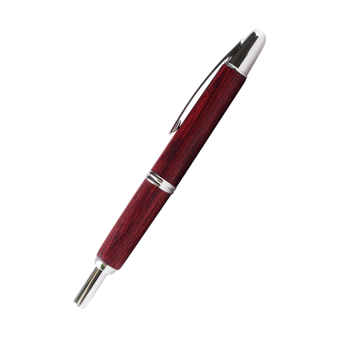 Pilot Vanishing Point fountain pen with a sleek birchwood barrel, showcasing its elegant design and smooth ink nib.