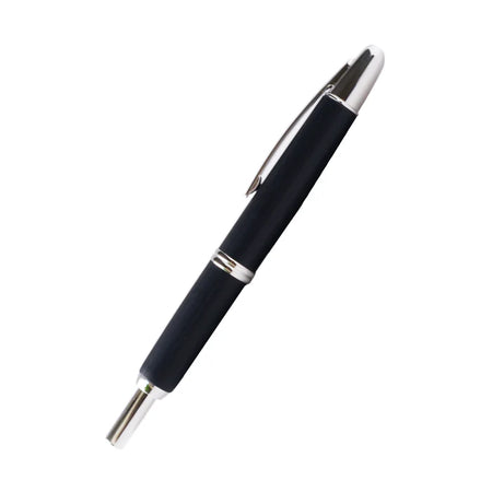 Pilot Vanishing Point fountain pen with a sleek black finish and birchwood accents, showcasing its elegant design and craftsmanship.
