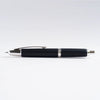 Pilot Vanishing Point fountain pen with a sleek black finish and birchwood accents, showcasing its elegant design.