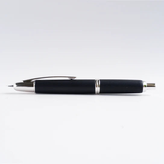 Pilot Vanishing Point fountain pen with a sleek black finish and birchwood accents, showcasing its elegant design.
