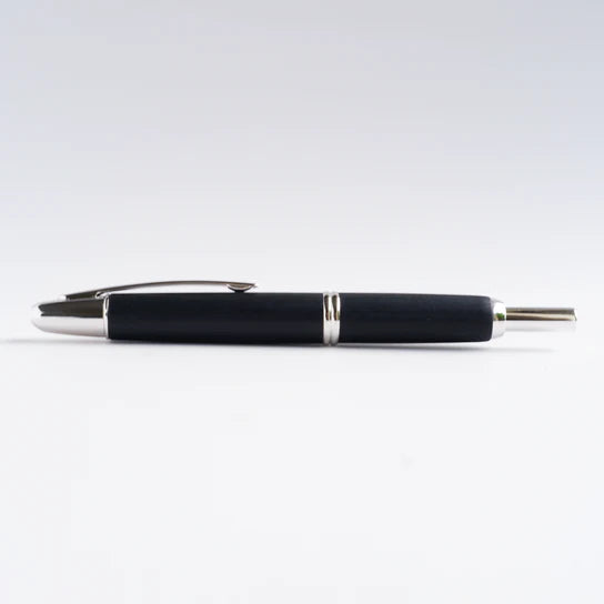 Pilot Vanishing Point fountain pen with a sleek birchwood finish, featuring a black nib and elegant design.