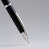 Pilot Vanishing Point fountain pen with black birchwood finish, featuring a sleek design and gold accents.