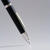 Pilot Vanishing Point fountain pen with a sleek birchwood barrel, featuring a modern design and gold accents.