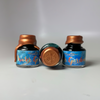 Papier Plume Dallas Pen Show Water Gardens fountain pen ink in limited edition bottle, vibrant blue ink for writing and calligraphy.