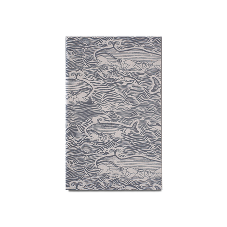 Giftsland whale-themed journal with a cover featuring illustrations of whales, perfect for writing and note-taking.