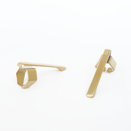 Y Studio pen clip attached to a sleek black pen, showcasing minimalist design and high-quality craftsmanship.