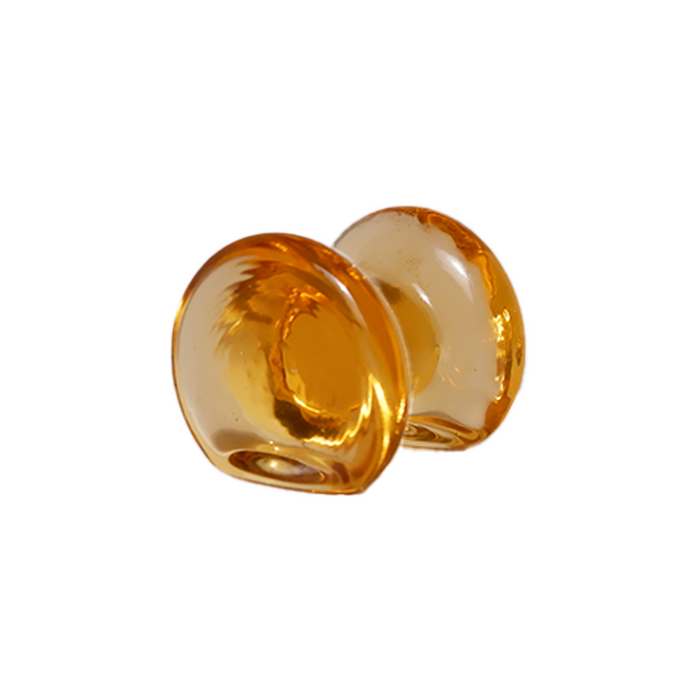 Yellow glass pen rest from Papier Plume, designed to hold pens and prevent ink spills on your desk.