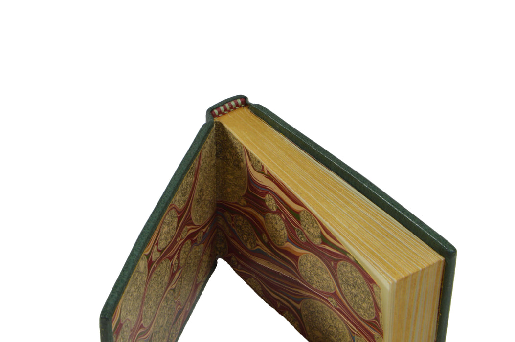 Anima Sola Fine Books small French 18th-century sketchbook journal with aged leather cover and handwritten sketches inside.