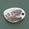 Silver Paper Fossil Art of a Tyrannosaurus craft by Assembli, showcasing detailed T-Rex design on metallic paper.
