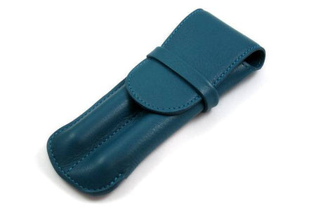 Large Atelier de la Foret pen pouch with two pens, in various colors, made of durable fabric and designed for everyday use.