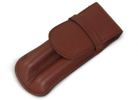 Atelier de la Foret large pen pouch with two pens in various colors, made of durable material, designed for organizing writing instruments.