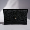 Black leather Swatch Card Holder by Papier Plume, compact leather swatch book card holder for organizing small cards.