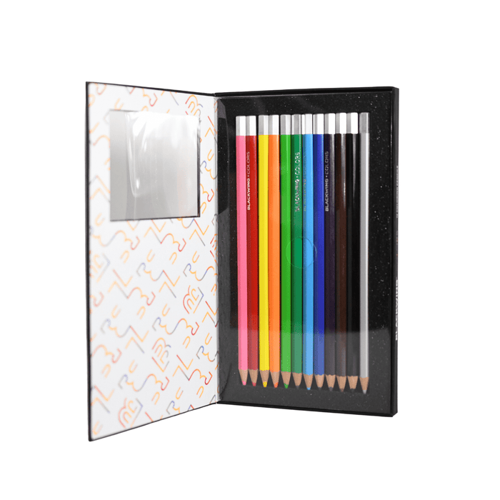 Blackwing Colors colored pencils in various vibrant shades, arranged in a row on a white background.