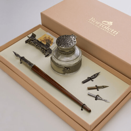Bortoletti calligraphy pen from the Gritti set, showcasing a sleek black ink pen with elegant gold accents.