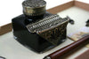 Bortoletti Tiziano writing set inkwell with elegant design, featuring a classic glass inkwell and metal accents.