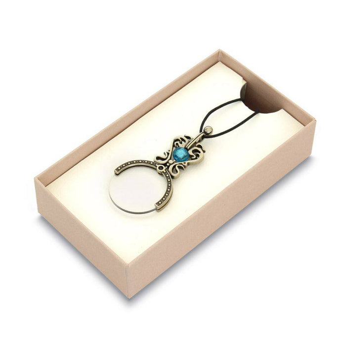 Black Bortoletti pocket or necklace magnifying glass with a compact, round lens and stylish design.