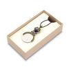 Black Bortoletti pocket or necklace magnifying glass with compact design and clear lens for close-up viewing.