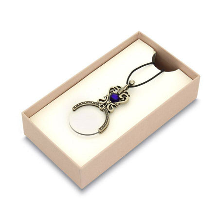 Black Bortoletti pocket or necklace magnifying glass with compact design and clear lens for close-up viewing.