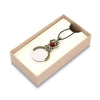 Black Bortoletti magnifying glass pocket or necklace, compact and stylish with a clear optical lens for close-up viewing.