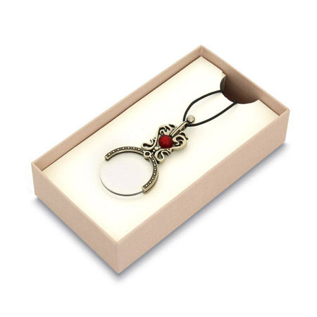 Black Bortoletti magnifying glass pocket or necklace, compact and stylish with a clear optical lens for close-up viewing.
