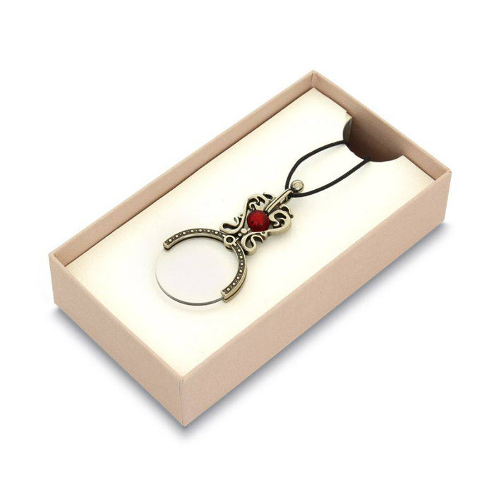 Black Bortoletti magnifying glass pocket or necklace, compact and stylish with a clear optical lens for close-up viewing.