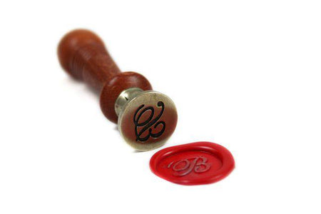Bortoletti Script Monogram Wax Seal with ornate monogram design on a sealing wax piece.