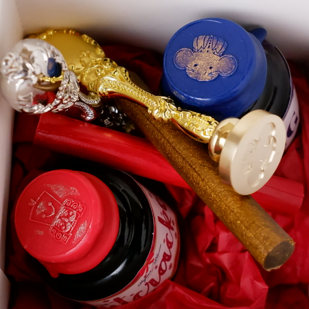 Papier Plume Nutcracker wax seal and ink set inside box, featuring limited edition fountain pen ink and decorative wax seal.