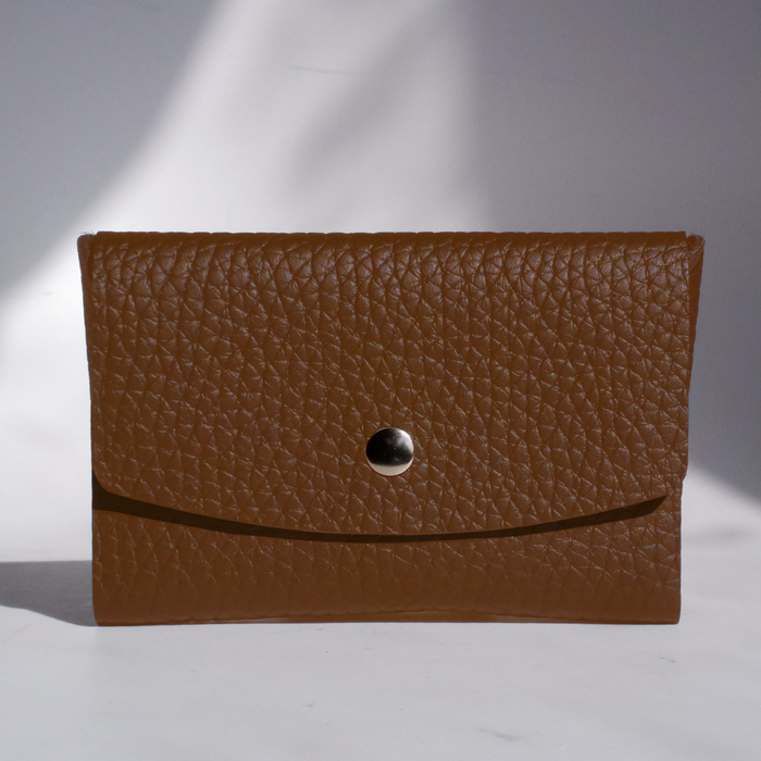 Brown leather Swatch Card Holder from Papier Plume, compact leather swatch book with multiple card slots for organizing samples.