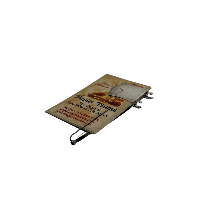 Antique Papier Plume dance card holder with intricate design and vintage style, perfect for holding event or dance cards.