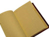 Leather-bound address book by Cartiglio with a hard cover and old world traditional spine, ideal for organizing contacts.