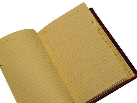 Leather-bound address book by Cartiglio with a hard cover and old world traditional spine, ideal for organizing contacts.