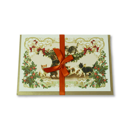 Rossi Christmas card featuring adorable kittens with festive holiday decorations and colorful seasonal design.