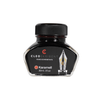 Cleo Skribent bottled fountain pen ink in caramel color, shown in a glass ink bottle with a black cap and label.