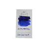 Cleo Skribent bottled fountain pen ink in ultramarine blue, showing the glass ink bottle with blue ink inside.