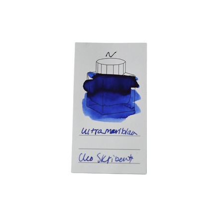 Cleo Skribent bottled fountain pen ink in ultramarine blue, showing the glass ink bottle with blue ink inside.