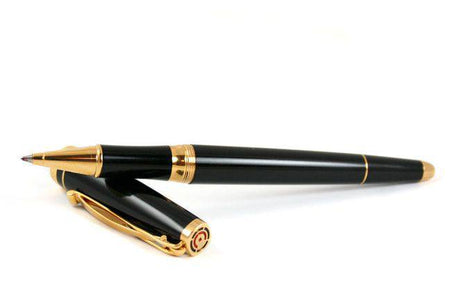 Cleo Skribent Skribent Gold black rollerball pen with gold accents, sleek and stylish writing instrument.